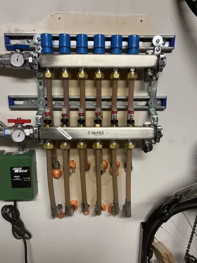 Plumber performing Gas Line Installation at a residential property in East Lansing