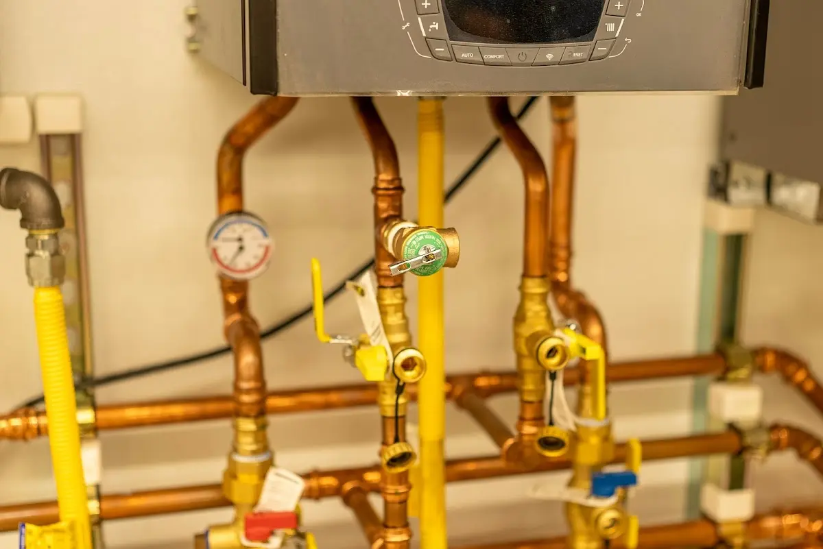 Licensed technician providing Backflow Prevention for a homeowner in East Lansing